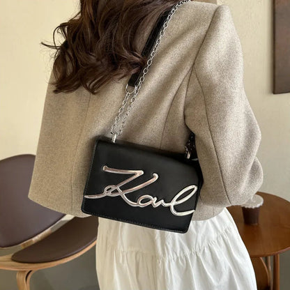 Bolsa tiracolo feminina karl preto modelo 1